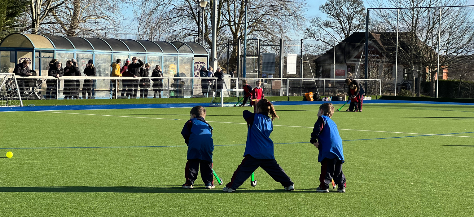 students playing hockey