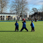 students playing hockey